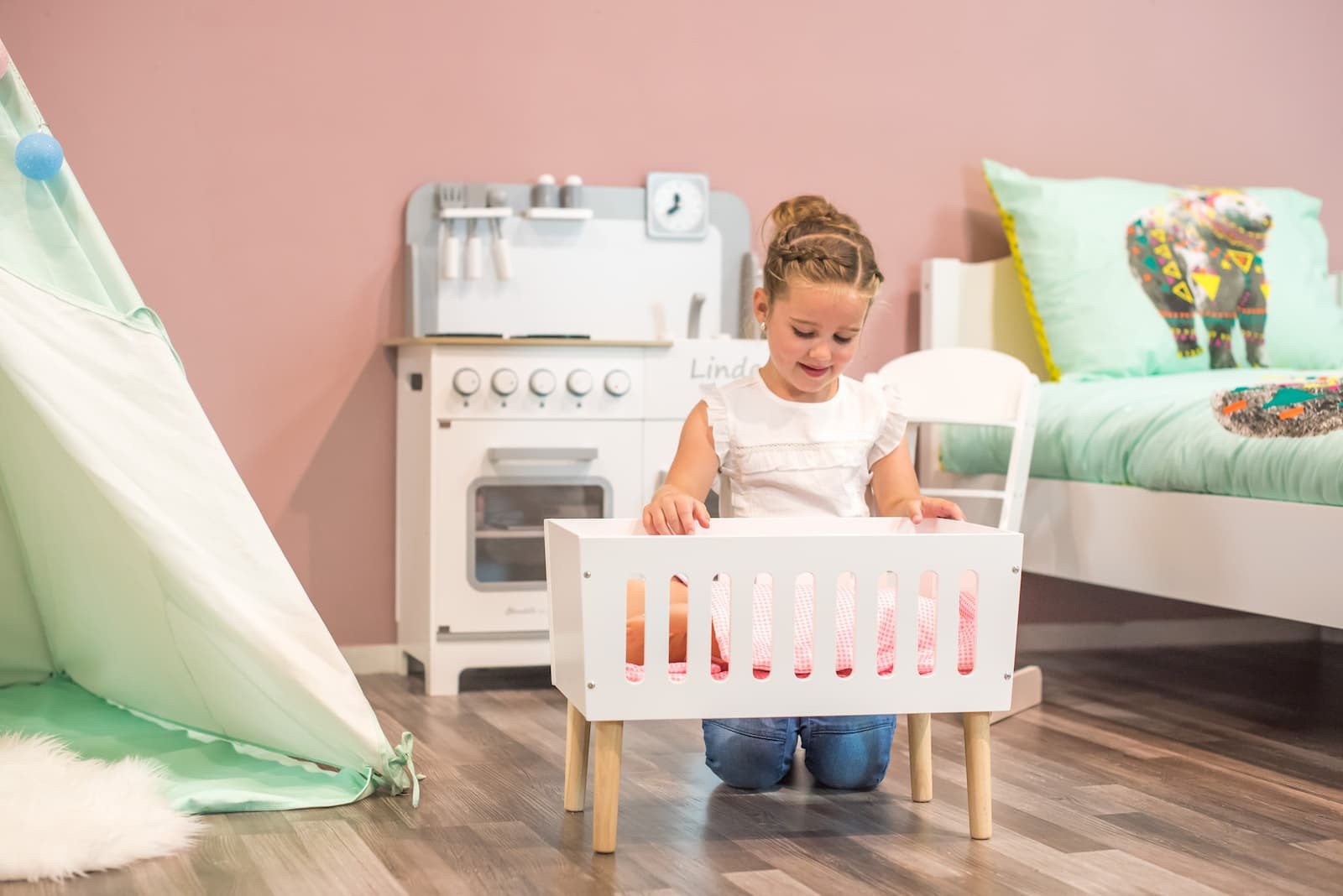 With the cutest doll beds